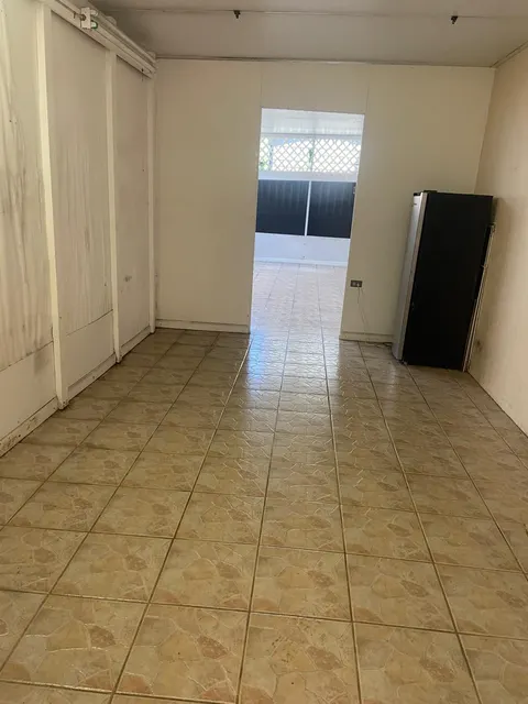 Empty tile-floor room cleaned for a move-out